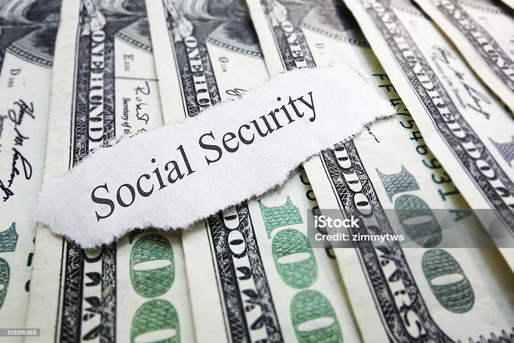Social Security newspaper scrap on assorted money